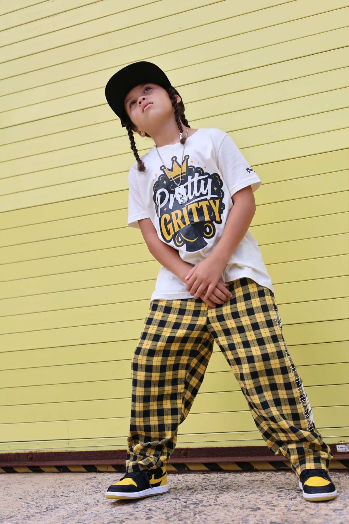 Irie wearing the Pretty Gritty ivory graphic tee
